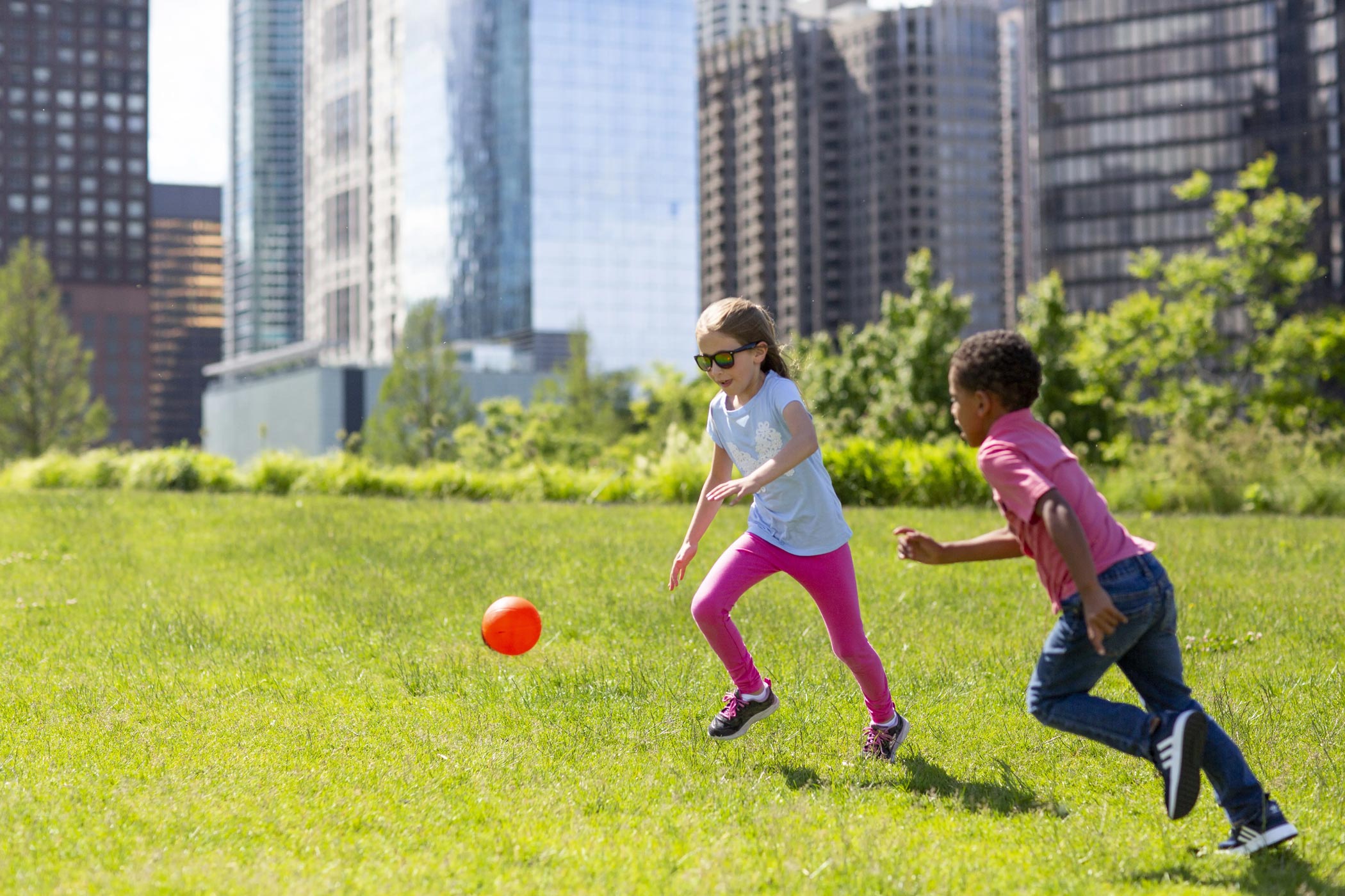 Kids running in grass